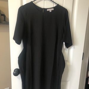 Black dress with attached tie for bow